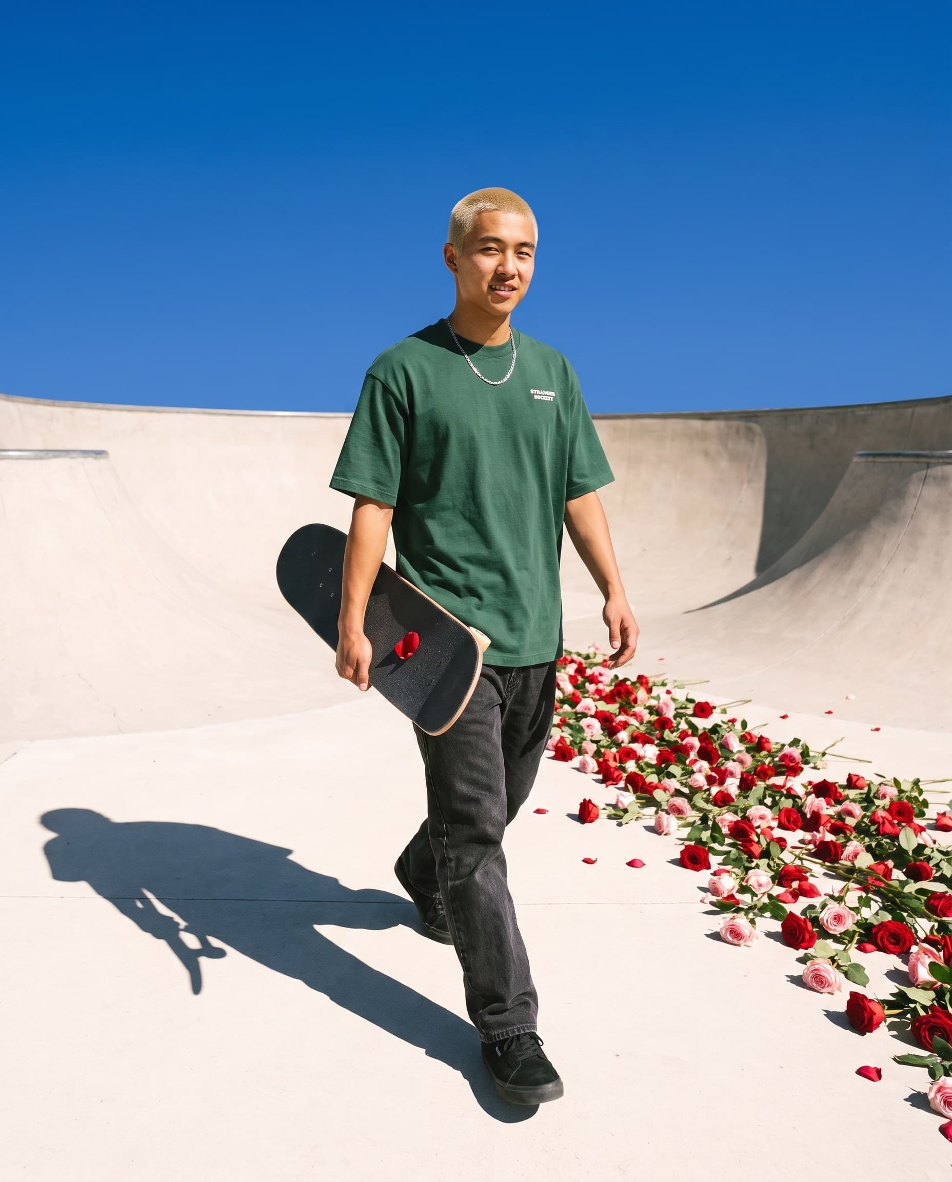 Skateboard under one arm, Bouquet tee