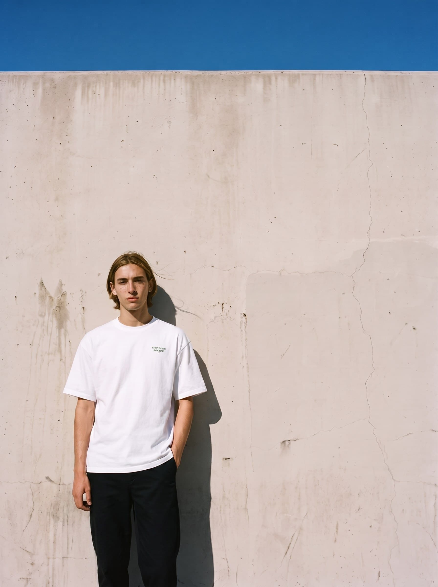 Against the concrete wall, Bold Bouquet tee